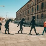 people walking on sidewalk during daytime